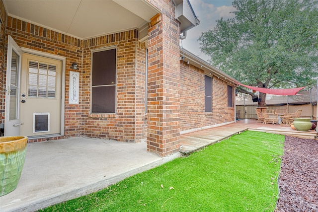 doorway to property featuring a patio area