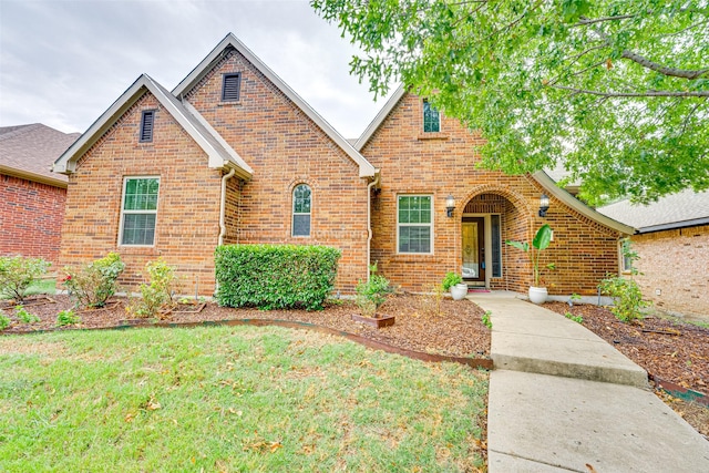 view of front of property with a front lawn