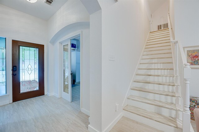 foyer with light hardwood / wood-style flooring