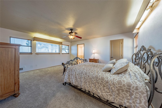 bedroom featuring carpet flooring and ceiling fan