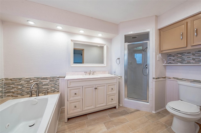 18409 Shore Dr, Kemp, TX 75143 - full bathroom featuring vanity, separate shower and tub, and toilet