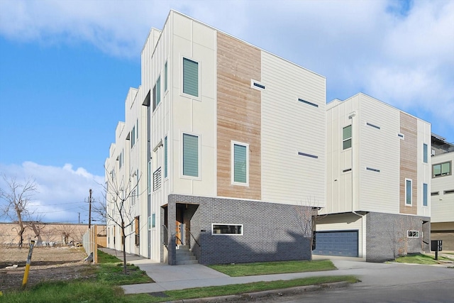 view of building exterior featuring a garage