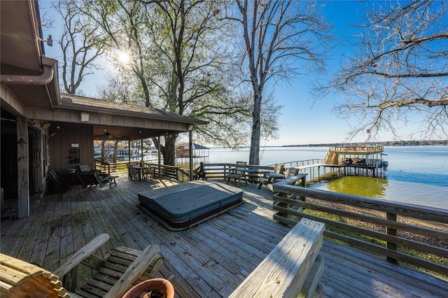 wooden terrace with a water view