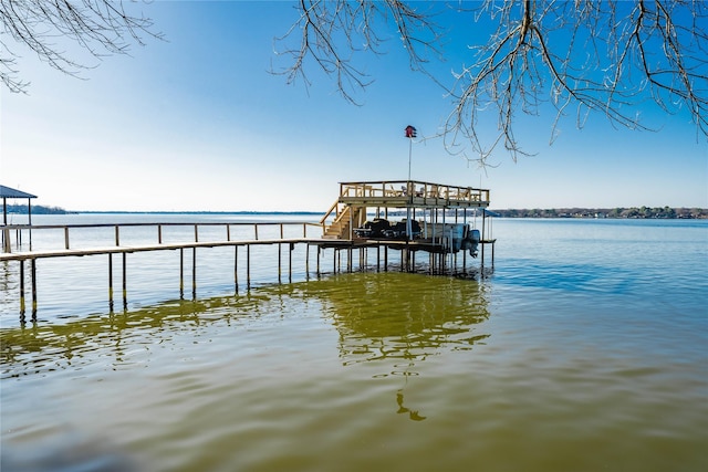 dock area featuring a water view