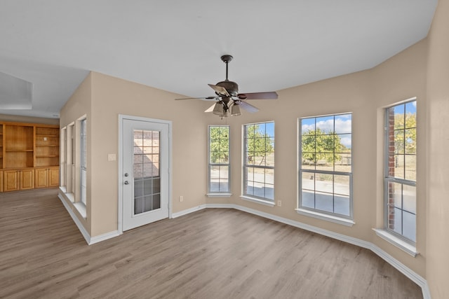 unfurnished room featuring ceiling fan and light hardwood / wood-style floors