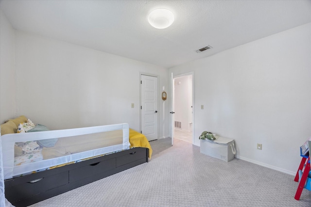 bedroom featuring carpet floors