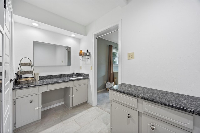 bathroom featuring vanity and tile patterned floors