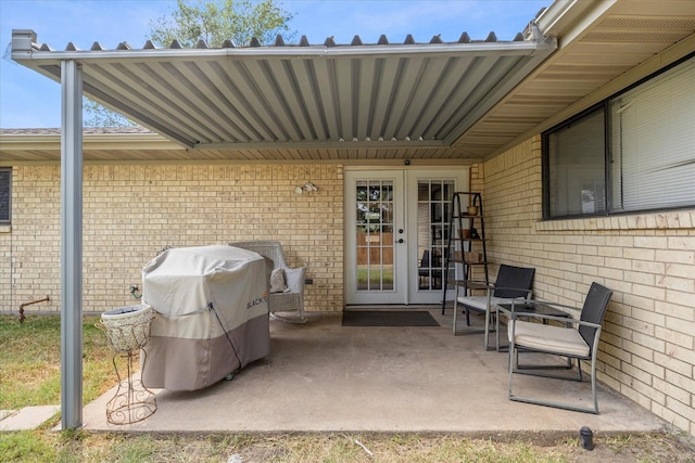 view of patio / terrace featuring french doors and a grill