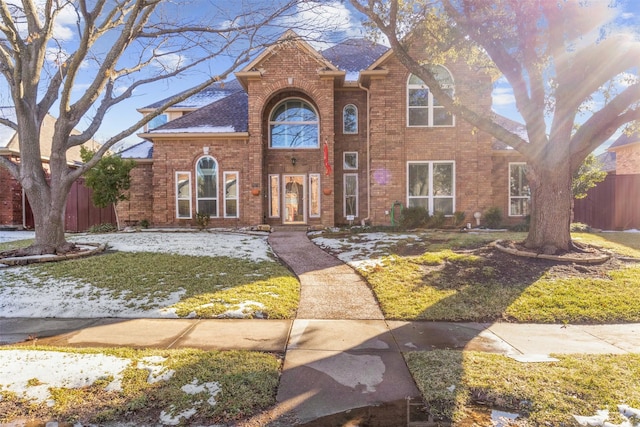 view of property featuring a front yard