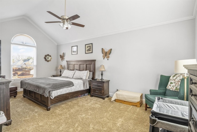 carpeted bedroom with ceiling fan, lofted ceiling, and crown molding