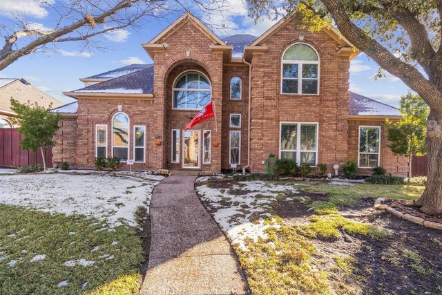 back of house featuring a patio and a pool with hot tub