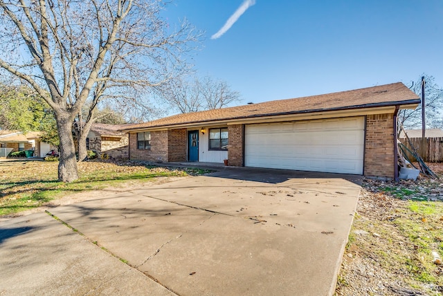 single story home with a garage