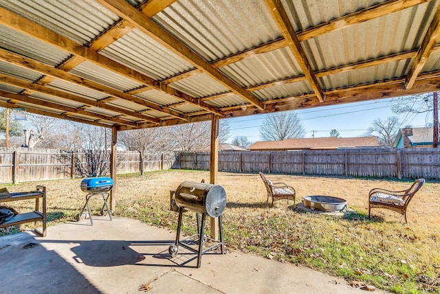 view of patio featuring a fire pit and grilling area