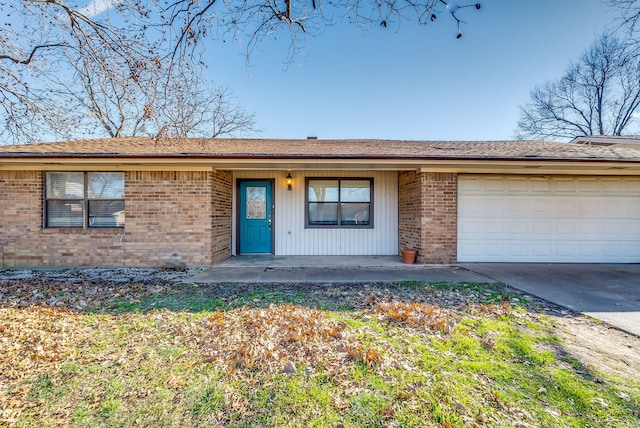 single story home with a garage