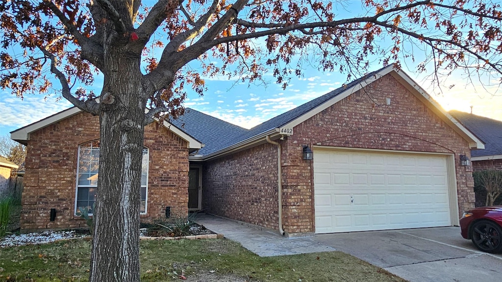 single story home featuring a garage