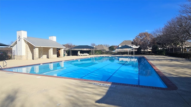 view of pool with a patio area