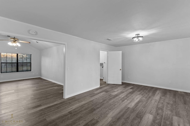 unfurnished room featuring ornamental molding, lofted ceiling, dark hardwood / wood-style floors, and ceiling fan