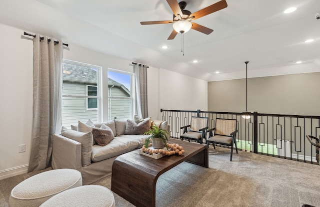 living room featuring ceiling fan and carpet flooring