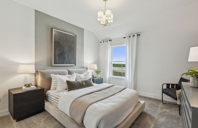 bedroom with lofted ceiling, light carpet, and a chandelier