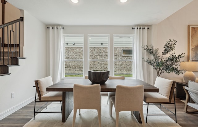 dining area featuring hardwood / wood-style floors