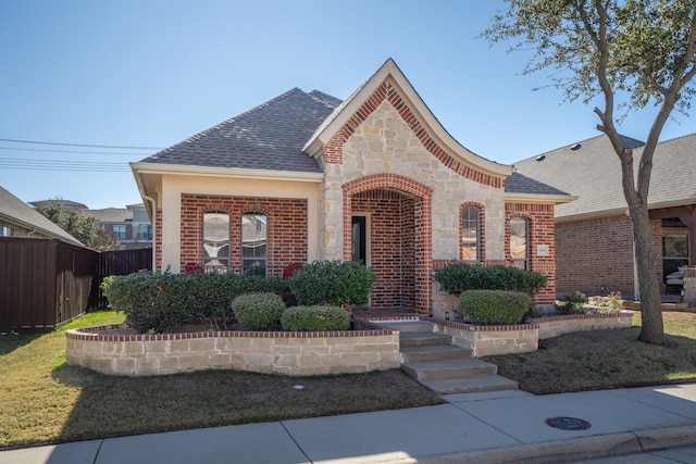 view of front of property with a front lawn