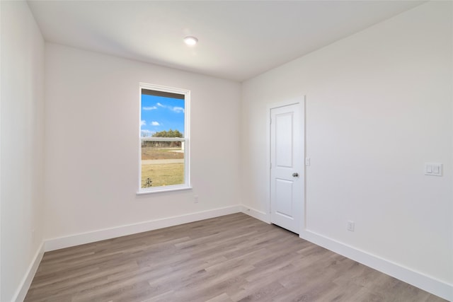 empty room featuring light hardwood / wood-style floors