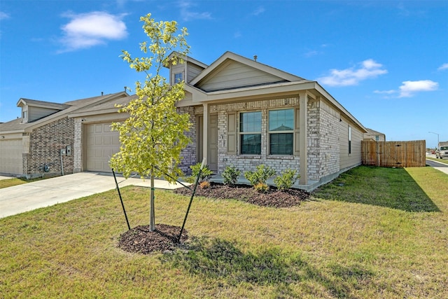 view of front of home featuring a garage and a front yard