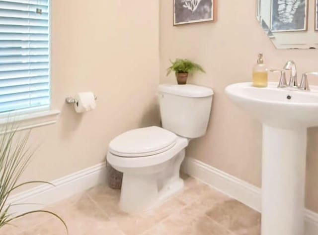 bathroom with sink and toilet