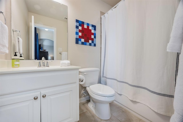 full bathroom with vanity, toilet, and shower / tub combo