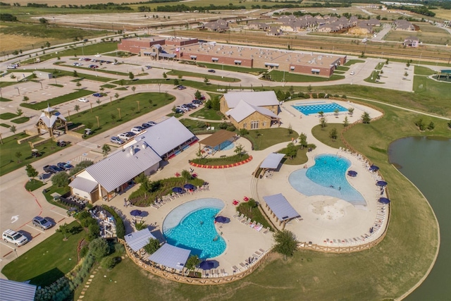 bird's eye view with a water view