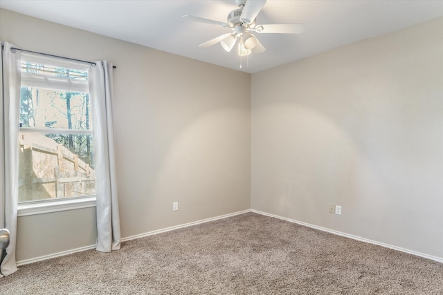 unfurnished room with carpet flooring and ceiling fan