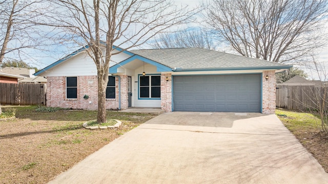 ranch-style house with a garage and a front lawn