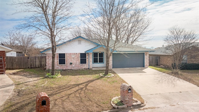 single story home with a garage and a front lawn