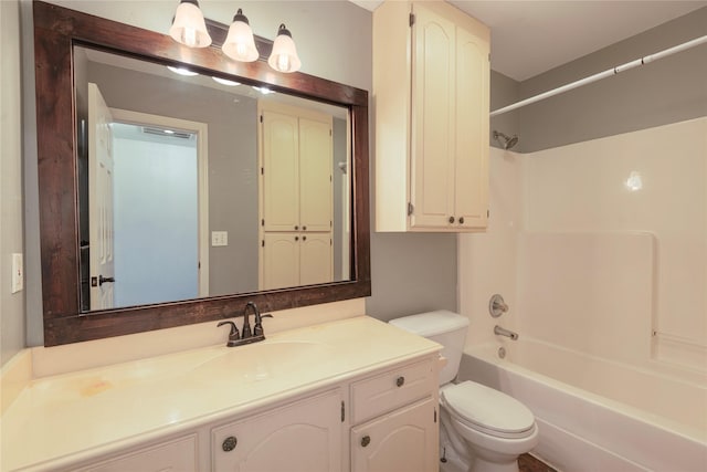 full bathroom featuring vanity, shower / washtub combination, and toilet