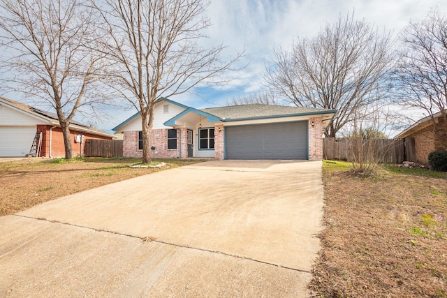 ranch-style house with a garage and a front lawn