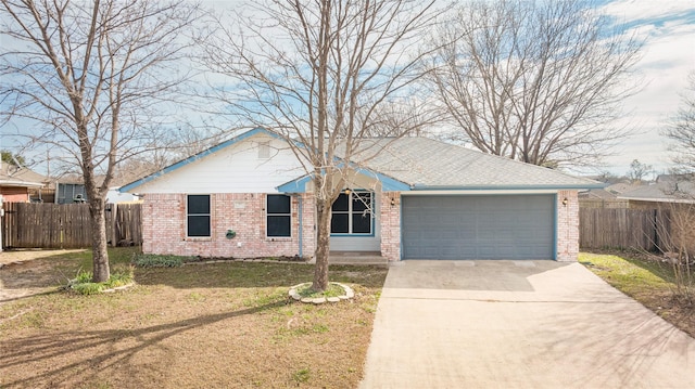 309 Rock Ct, Princeton, TX 75407 - single story home featuring driveway, brick siding, an attached garage, and fence