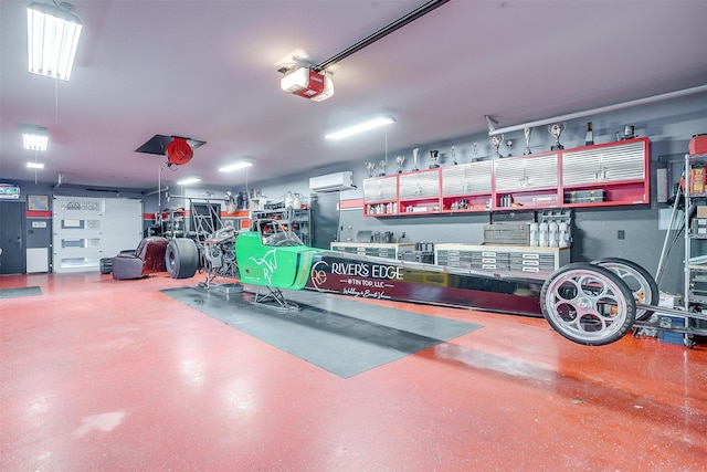 garage with a garage door opener and a wall unit AC