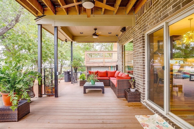 deck featuring an outdoor hangout area and ceiling fan