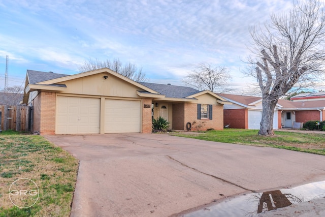 single story home with a garage and a front yard