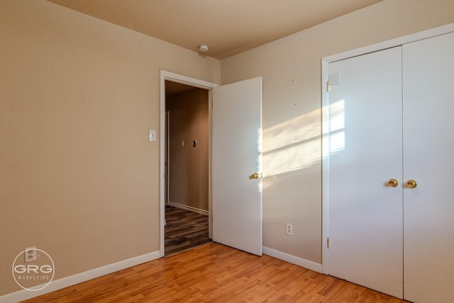 unfurnished bedroom with light hardwood / wood-style floors