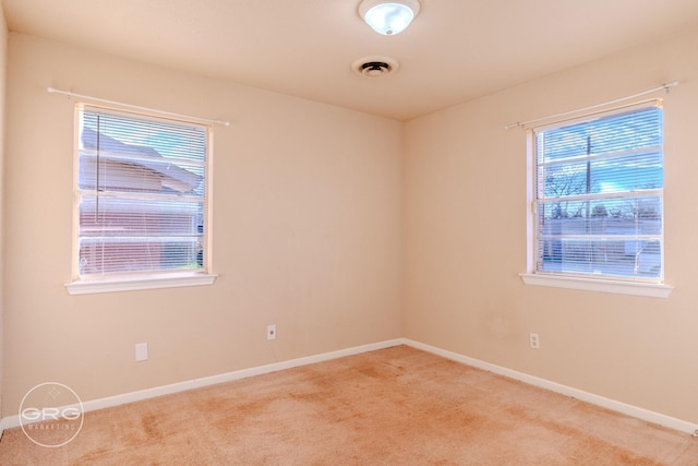 view of carpeted spare room