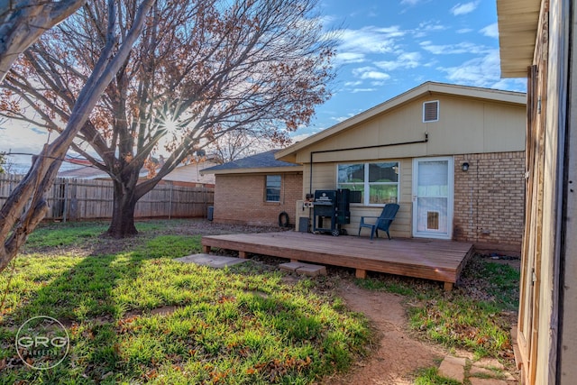 view of yard featuring a wooden deck