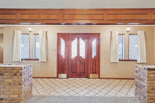 foyer with light tile patterned floors