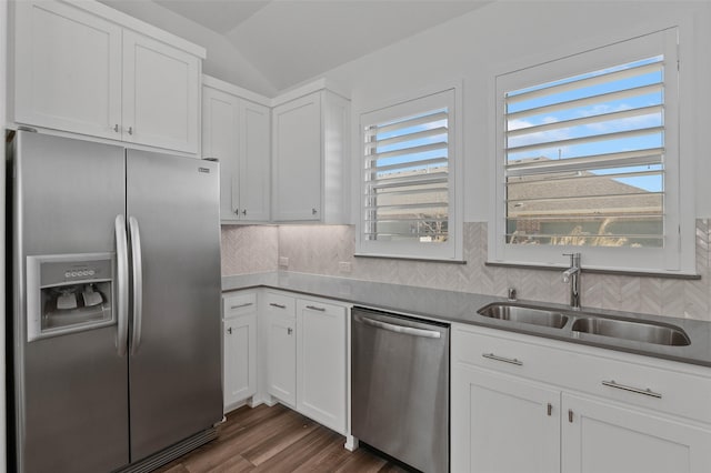 kitchen featuring white cabinetry, sink, stainless steel appliances, and plenty of natural light