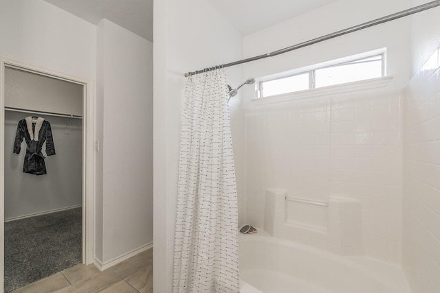 bathroom featuring shower / bathtub combination with curtain