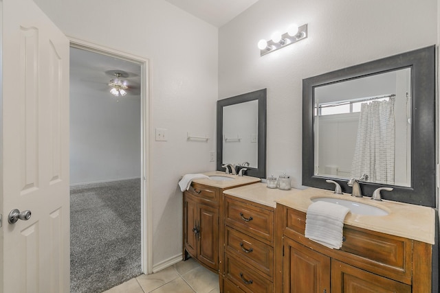 bathroom with tile patterned flooring and vanity