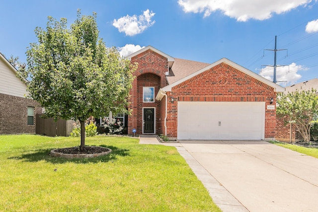 front facade featuring a front yard and a garage