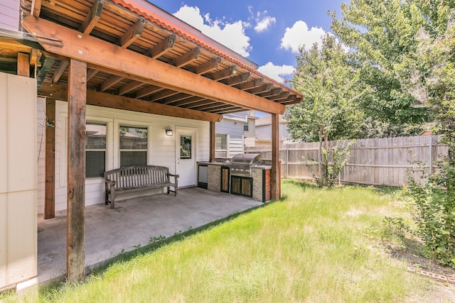 view of yard featuring area for grilling and a patio area