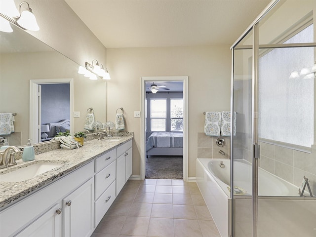 bathroom with tile patterned floors, ceiling fan, vanity, and independent shower and bath