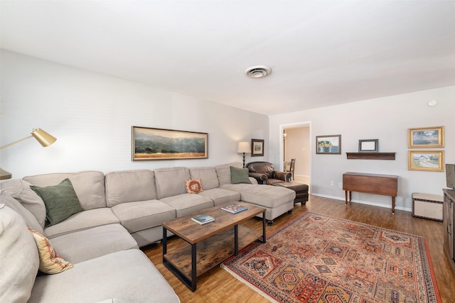 living room with hardwood / wood-style flooring